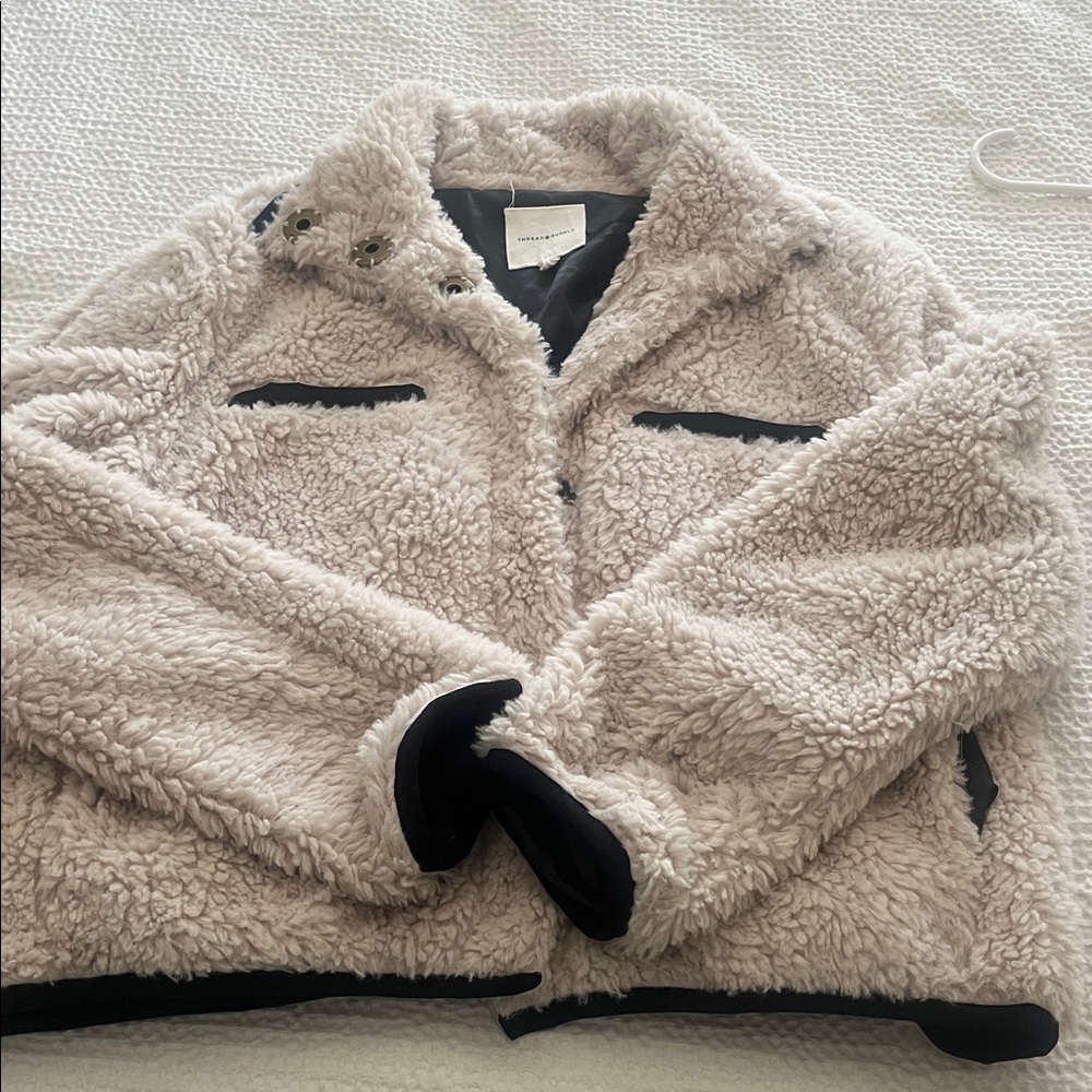 Thread & Supply Cream Teddy Jacket with Black Details. Snaps to the collar!